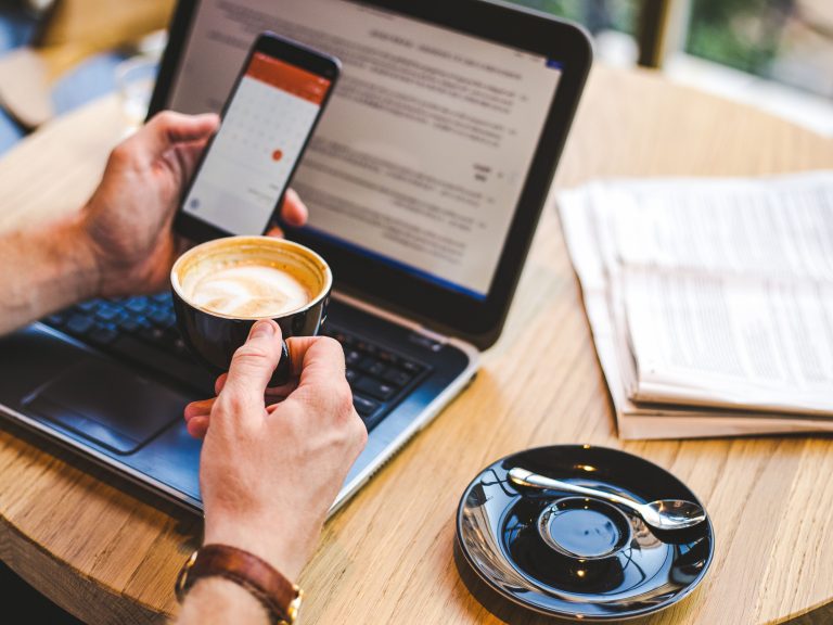 A person is working in a coffee shop